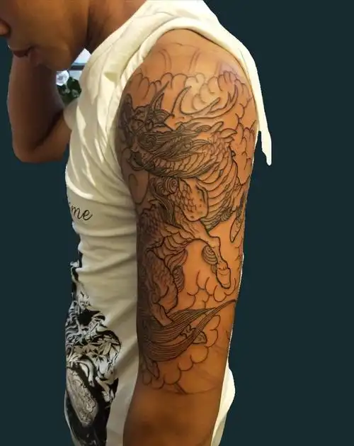 麒麟纹身图片_手臂新传统纹身图案