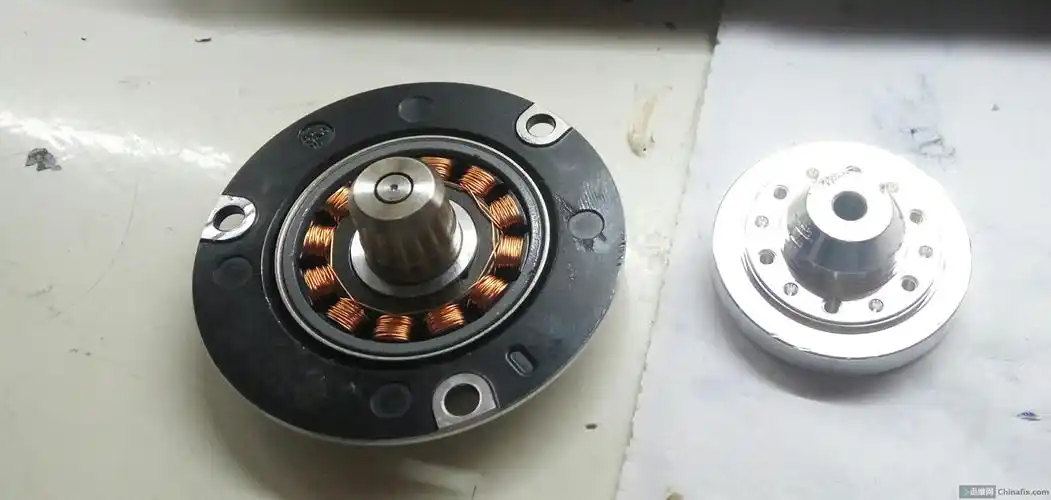 硬盘电机拆解后图,费了大力气才拆开的.