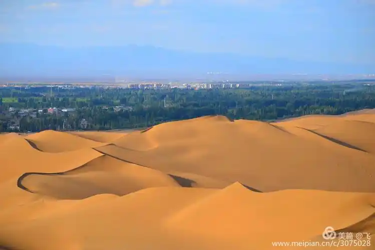其它 与绿洲相依的沙漠 写美篇       新疆库木塔格沙漠风景名胜区是