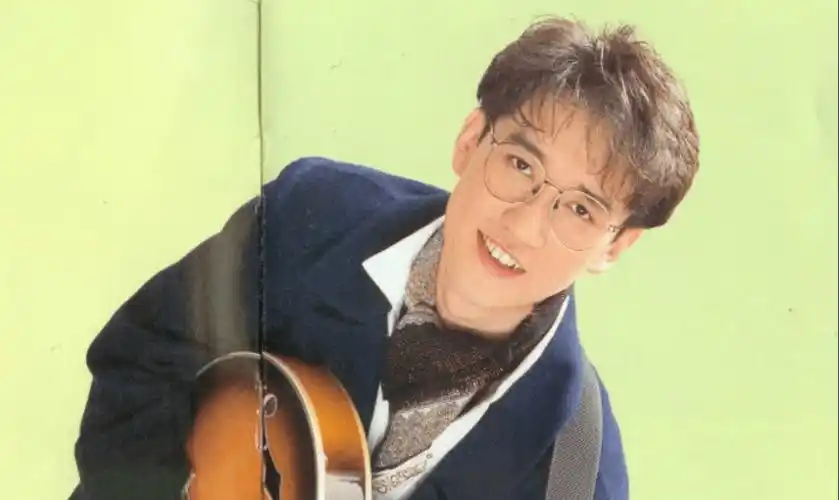 从鬼门关回来的情歌教父_周传雄