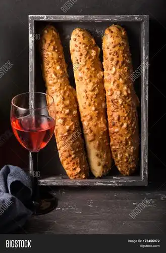 homemade freshly baked french baguettes. rustic style.