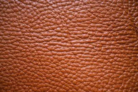 全粒面浅棕色皮革纹理照片