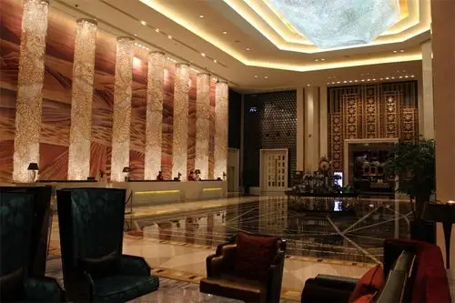 在酒店大堂设计中,设计总监周正良希望能够将中式元素融入到空间设计