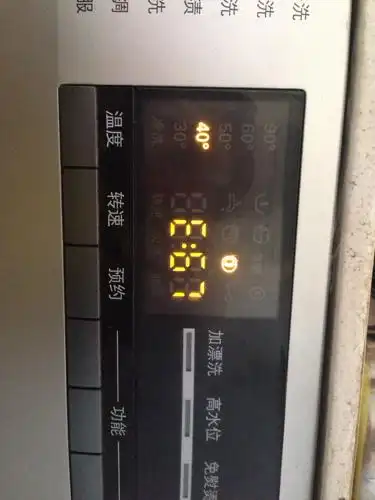 我们家的西门子洗衣机想洗衣服,结果把衣服放在里显示e:67图标,开盖
