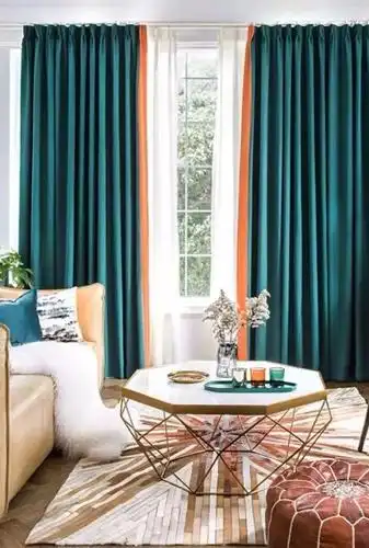 孔雀蓝和爱马仕橙已经奠定了空间上的高级感,这时简单的素白背景,就成