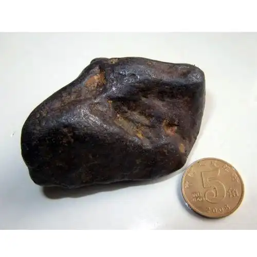 第63样磁铁矿石有与经典铁陨石对比图