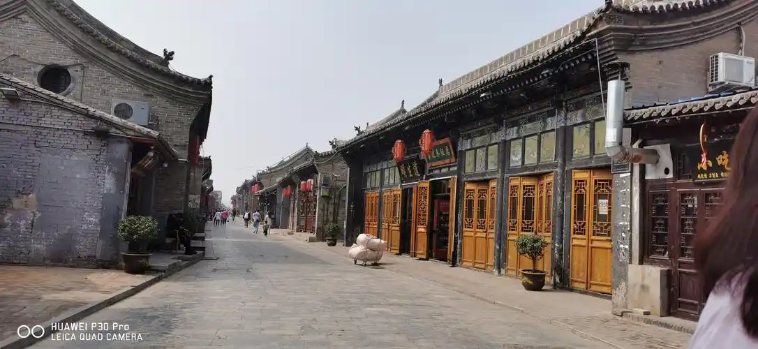 平遥古城是中国古代城市在明清时期的杰出范例,平遥古城保存了其