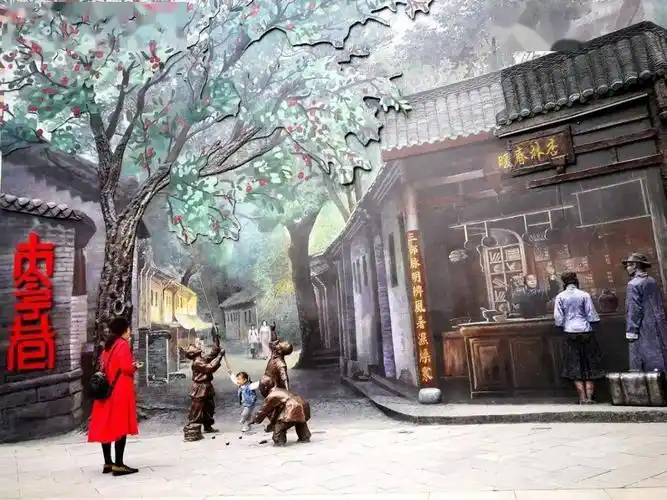 老成都元素的雕塑墙绘连井盖上都是玉林西路的专属logo还有中国传统