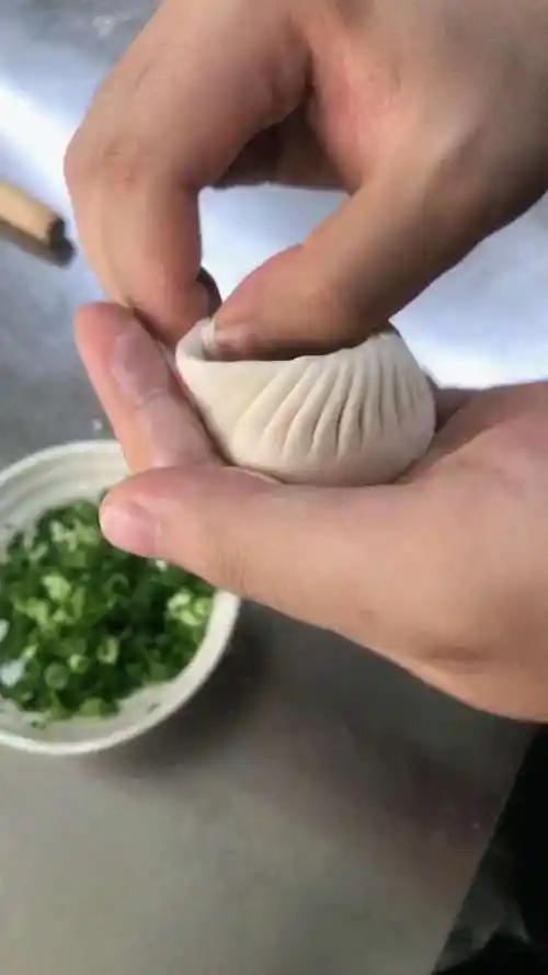 提褶包子手法口诀