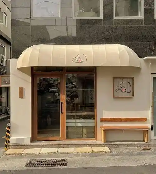 牙科创意门头视觉创意设计饮品店创意门头招牌设计极简纯粹的商业门头