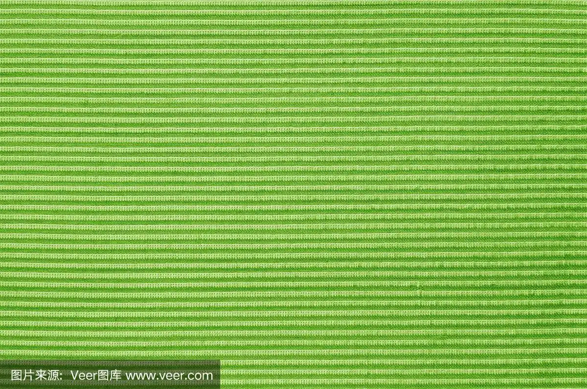 特写绿色或橄榄绿颜色的织物样品纹理.
