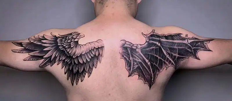 一半天使一半恶魔纹身图片背部欧美写实翅膀天使恶魔纹身图案