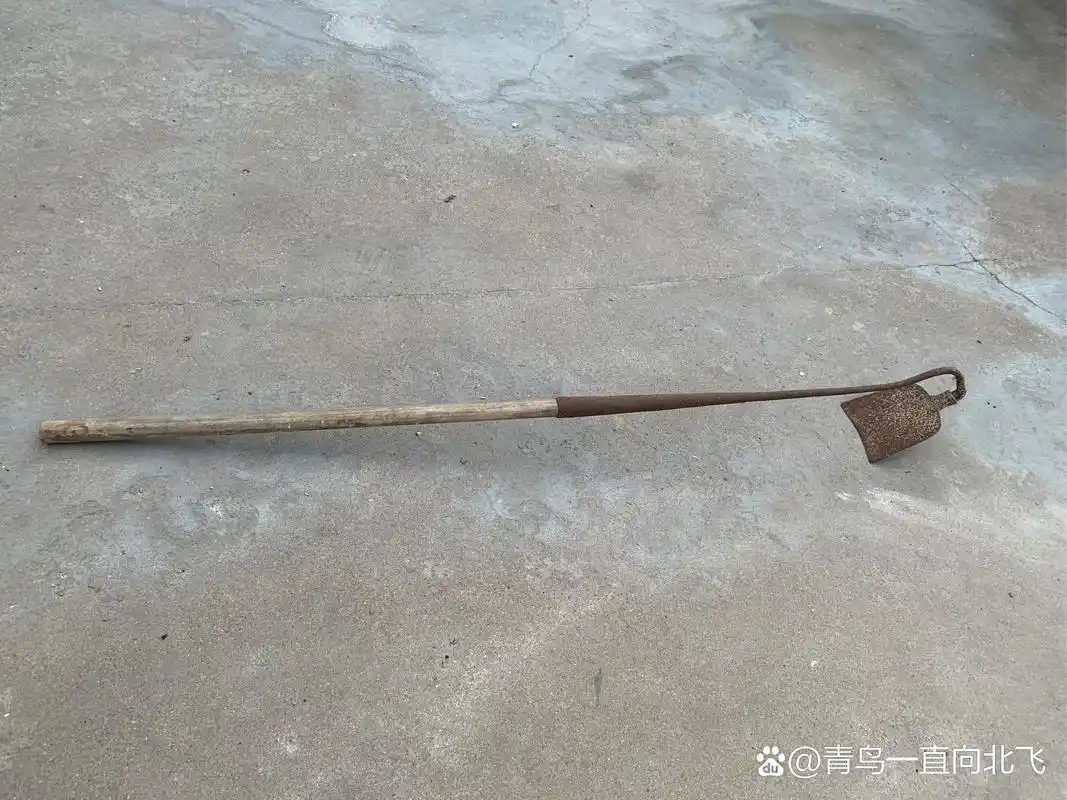 唐代诗人李绅的《悯农》中笔下的那个农民的那把传