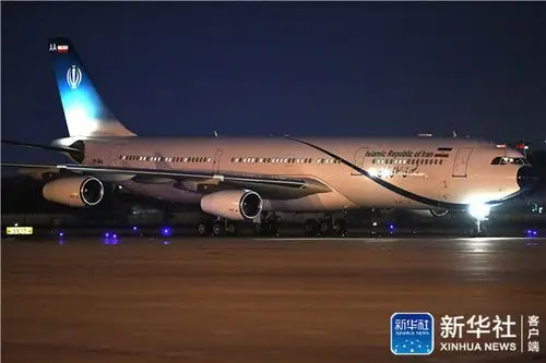 伊朗总统鲁哈尼抵达青岛