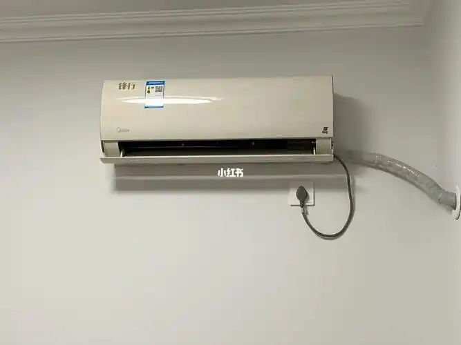 这款美的空调如何打开机盖!