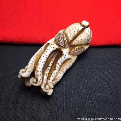 野猪牙雕刻人参把件