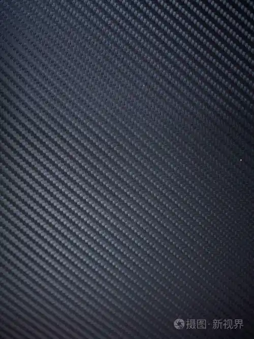 黑炭纤维纹理背景的宏观特写