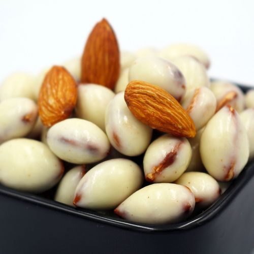 新疆酸奶巴旦木休闲零食奶香扁桃仁夹心杏仁无壳坚果仁500克包邮