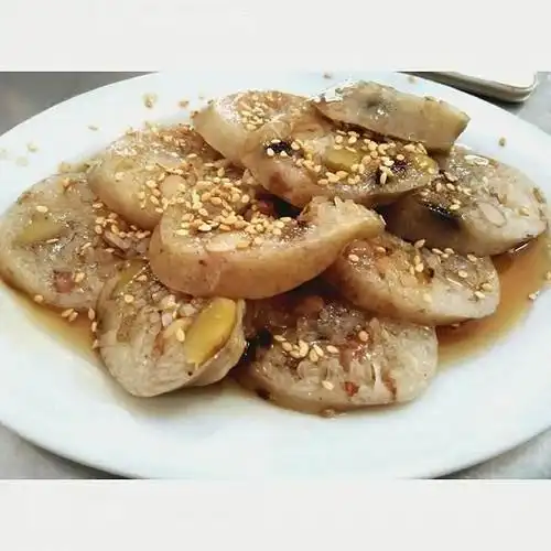 潮州美食——猪肠胀糯米_蘸甜酱油