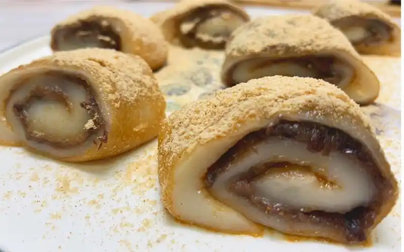 北京驴打滚,探寻小巷深处的特色美食(北京驴打滚特色美食)-52线报网