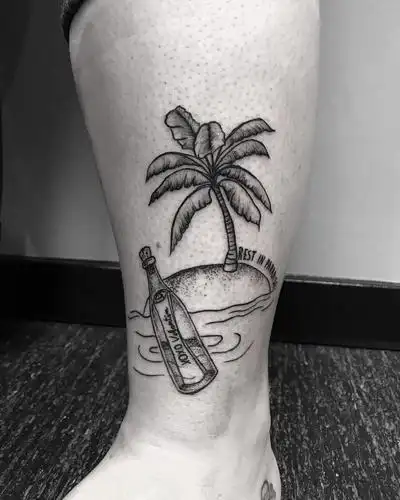 小腿黑灰椰子树漂流瓶纹身图案