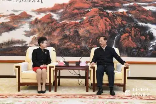 石泰峰会见中信银行董事长李庆萍