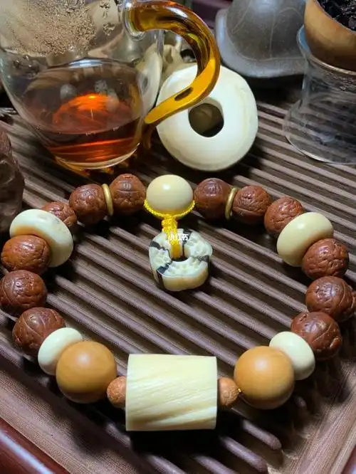 凤眼手持搭配橄榄核正圆光珠