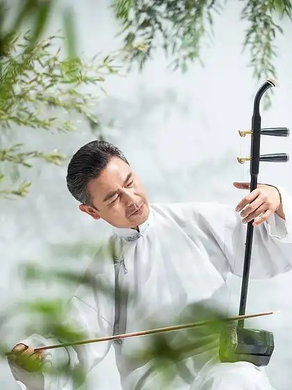 唯美二胡女子7137173琴弦乐器二胡插画9173274拉二胡音乐的插画727436