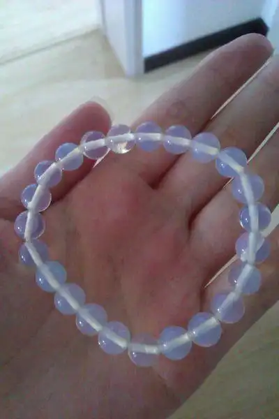 求大神帮忙看看新买的月光石是真是假,8mm的花了350值不值~为什么日光