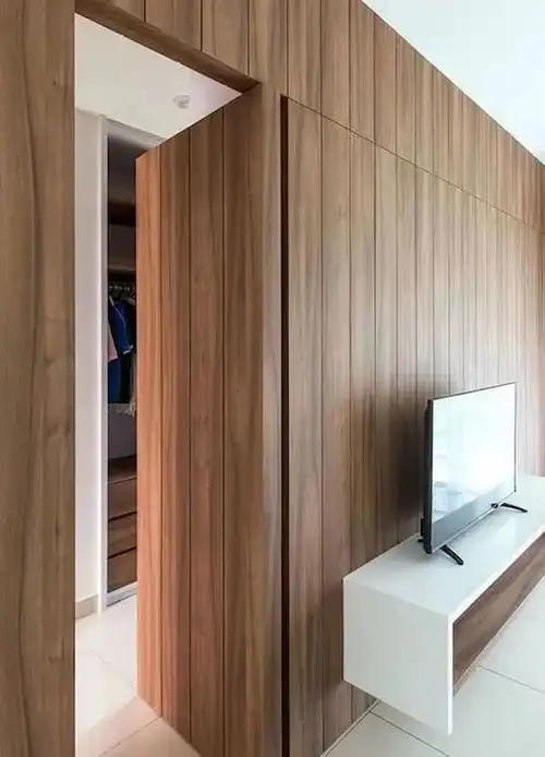 客厅隐形门隐形门即在客观的视觉感受上,能与墙面有融合性,使墙面整体