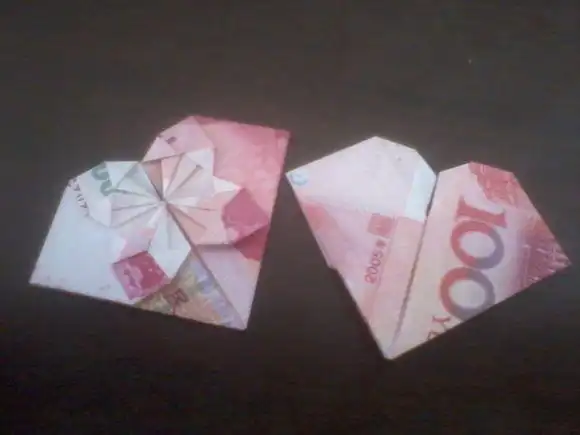 其它的叠法请看参考资料希望回答能够帮助你怎么用100块钱叠双心,要