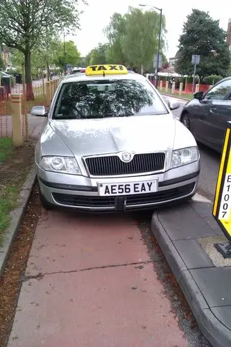 czech republik cyclestreets 03 taxi ae56 eay parked in and