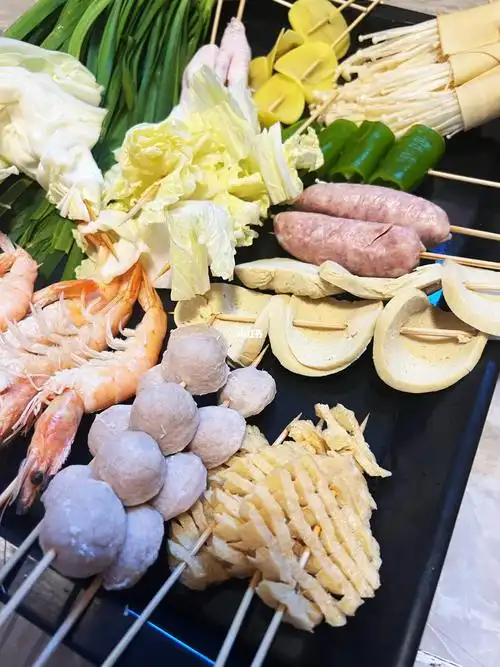 我说:你回国吃的也就这味,说不定还烧烤食材炸串青菜都有多少种类