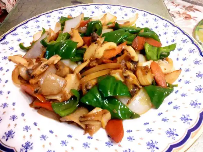 青椒炒海螺片怎么做好吃,青椒炒海螺片的家