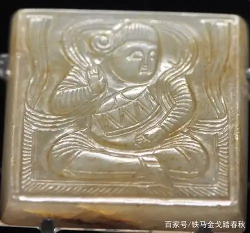 唐代胡人击鼓玉带板