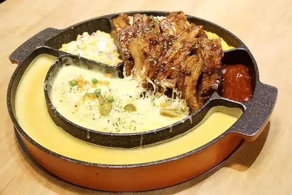 不是芝士焗排骨,也不是芝士火锅 排骨,而是用融化的拉丝芝士卷裹