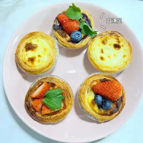 如果一定要加,可以在出盘后的蛋挞上挤上奶油,放上水果点缀,不仅美观