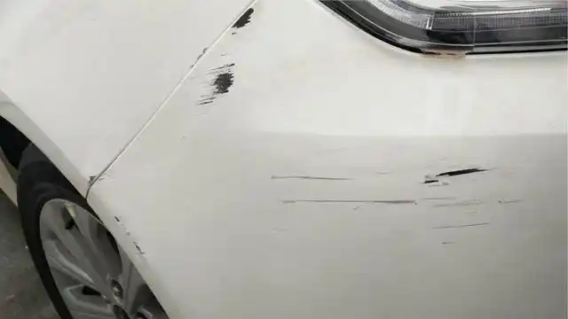 汽车划伤打什么电话