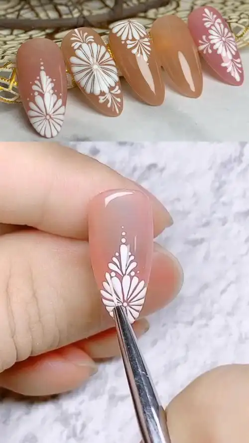 用彩绘胶画的小笔彩绘太阳花美甲