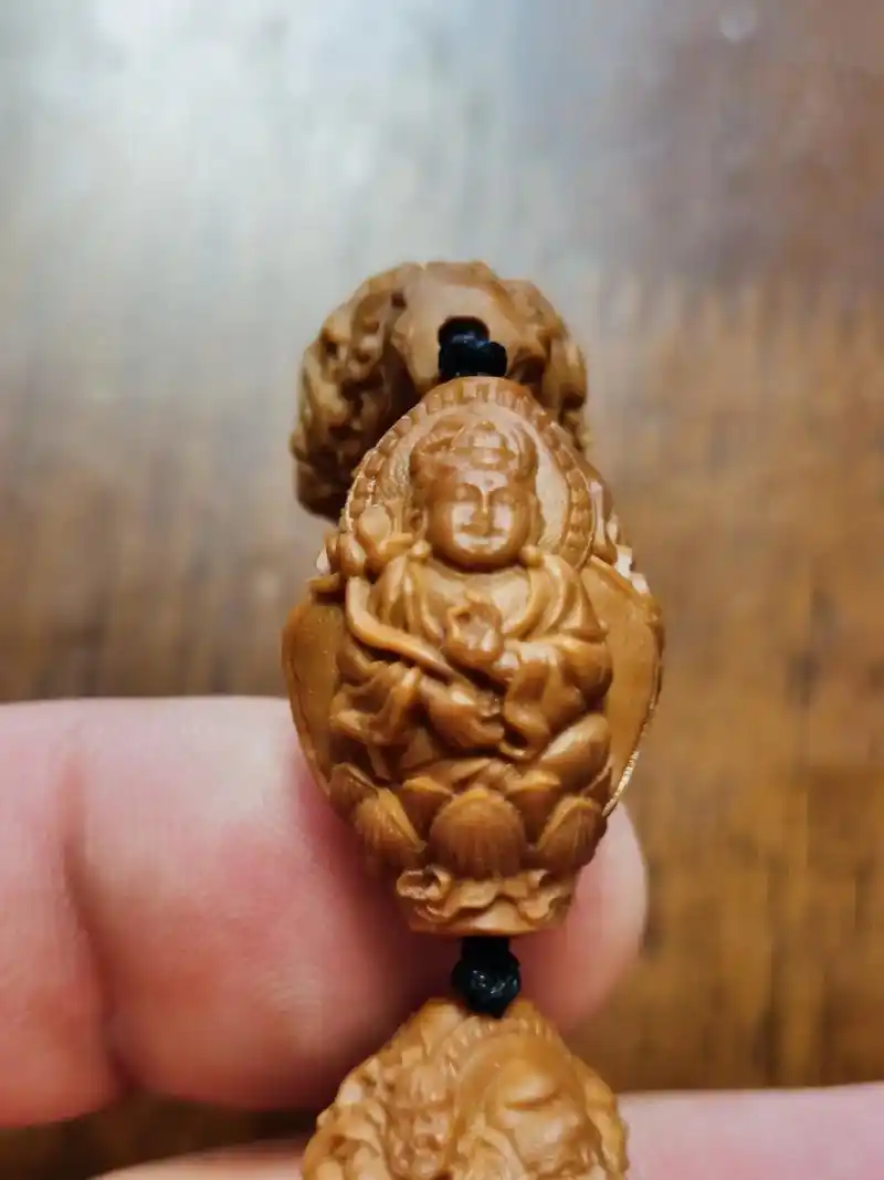 齐飞款【九龙万佛】#橄榄核核雕 #九龙万佛#弘扬传统文化 # - 抖音