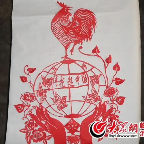 剪纸巧手托起中国梦