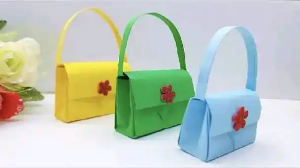 教你用纸手工制作手提包,蛮漂亮的,一看就会