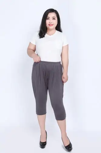 加肥加大码女装2019夏季宽松弹力200斤胖mm小脚七分休闲哈伦裤子