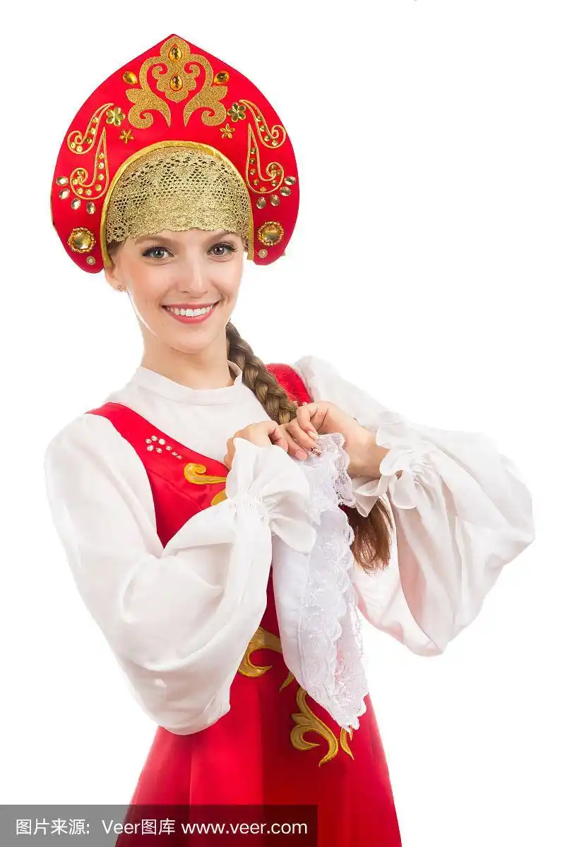 美丽的微笑的俄罗斯女孩穿着民族服装