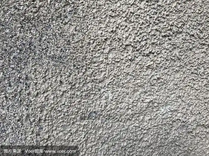 凹凸不平的灰黑色水泥墙面图案