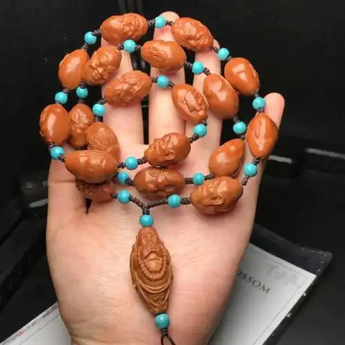 文玩爆款十八罗汉小籽手持款苏工核雕橄榄核手工雕刻手串脖挂挂脖