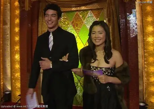 丹尼斯吴写真-703x496.82k.-明星写真馆n63.com