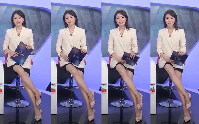 周悦珊制服诱惑超短裙美腿主持《体育世界》20210328,春光若隐若现