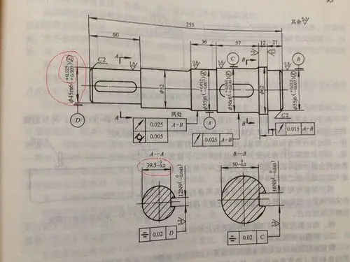 下图是原来图纸: 轴的剖视图尺寸标注为39.5,上公差0下差-0.