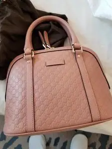 古驰贝壳包粉色